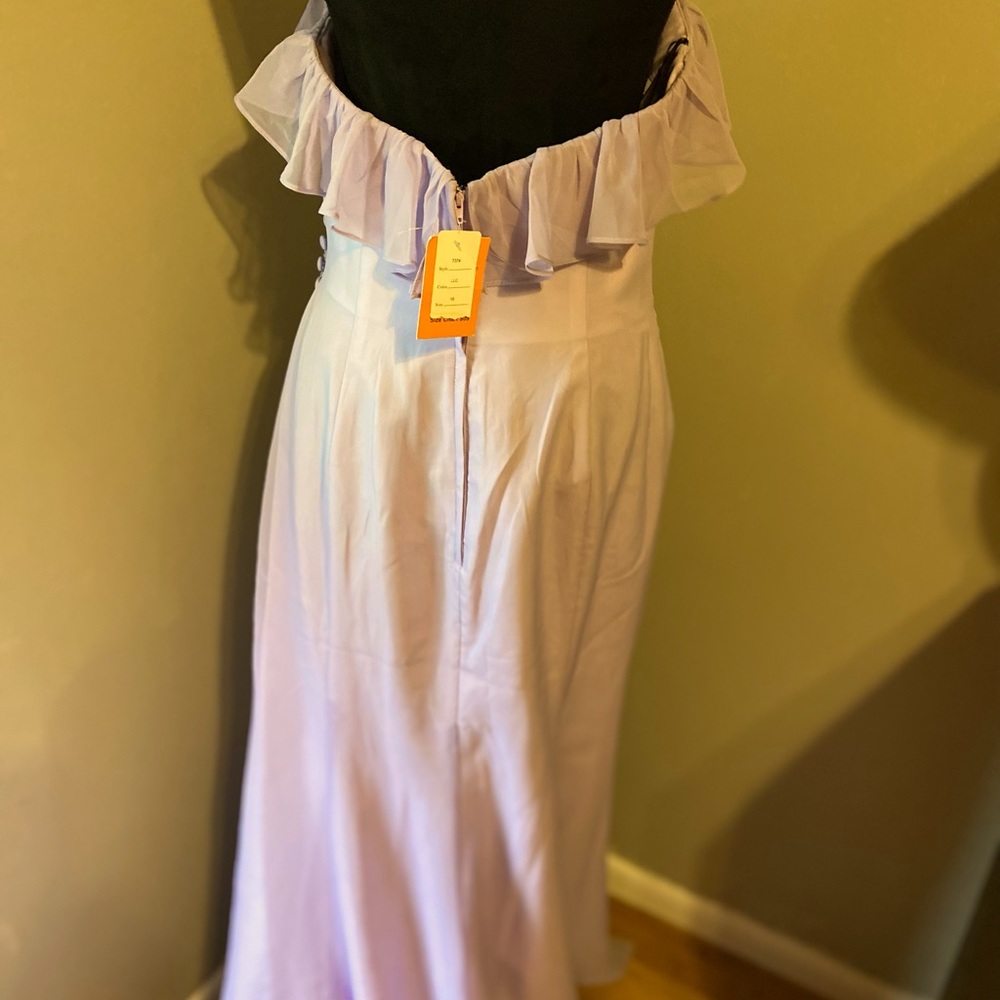 This dress is the Eden Bridesmaids Brand new tag evening/wedding gown